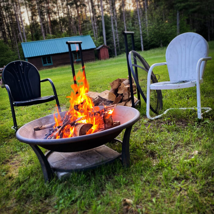 A photo the firepit at Sugar Maple at Hansen Lake, the perfect place to tell tall tales about “the one that got away.”